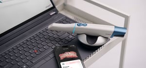 TRIOS6_scanner_with_laptop_and_phone_2025_HIGH-small-resolution-e1741440144574