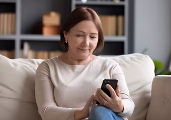 WomanLookingAtPhone